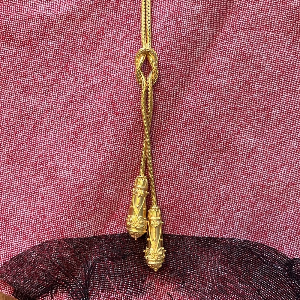Gold-like beautiful costume necklace with knot